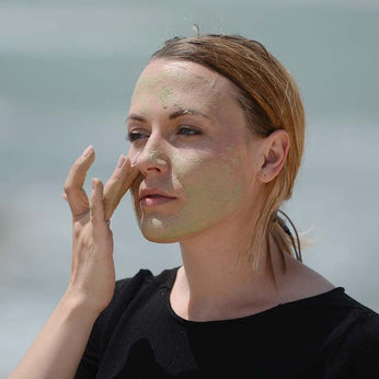 Application of green Mediterranean clay on the face