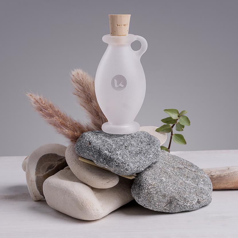 Frosted glass bottle in a hand-blown amphora style with cork closures
