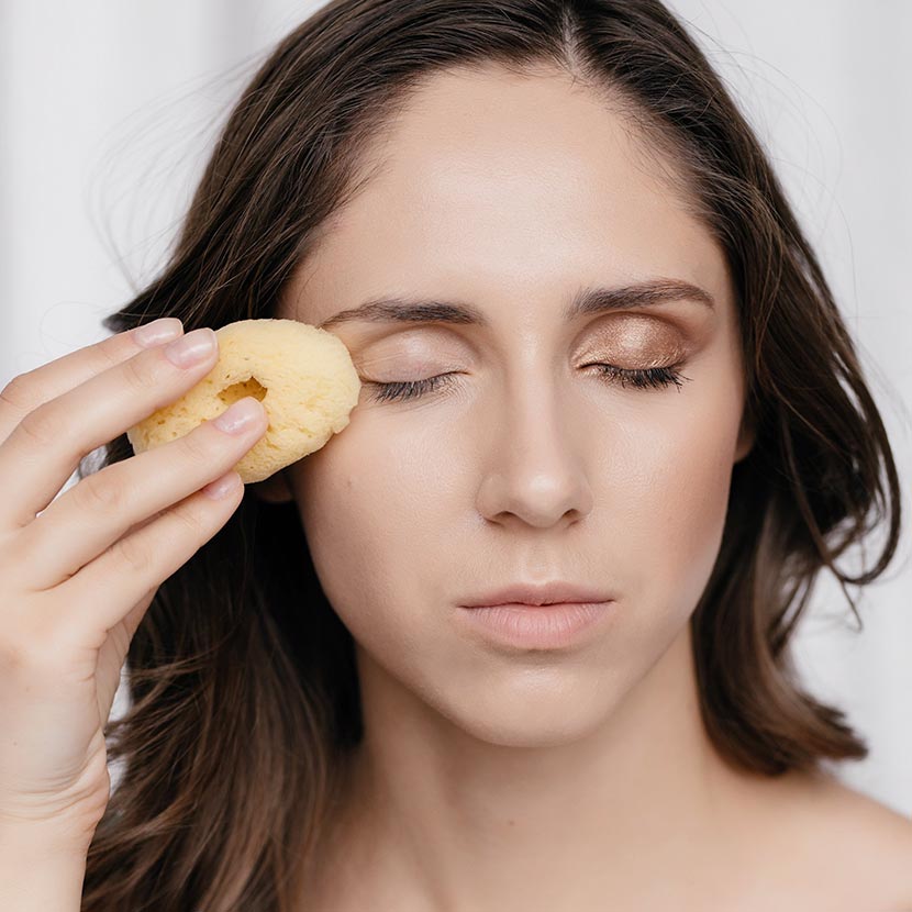 Removing makeup with a sea sponge